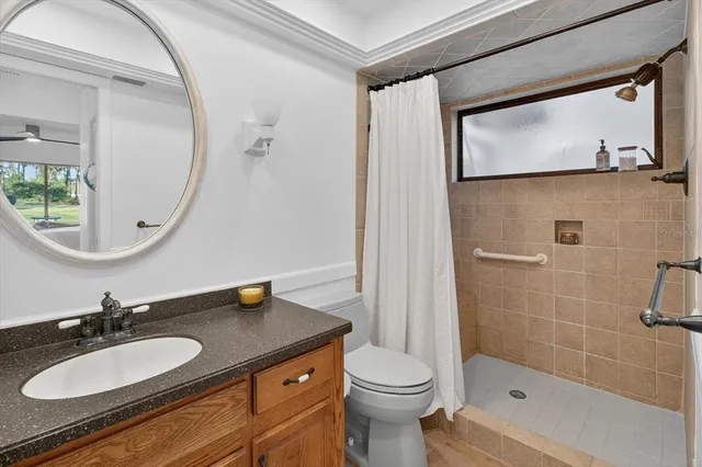 a bedroom with a bed and a balcony