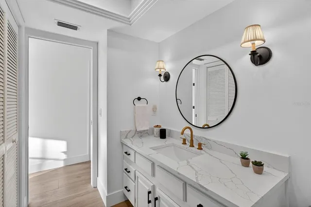 a bathroom with a shower and a mirror