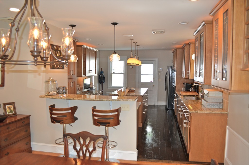 425 Trafton Road Springfield, MA 01108 - Photo 14 of 28 a very nice looking dining room with chairs