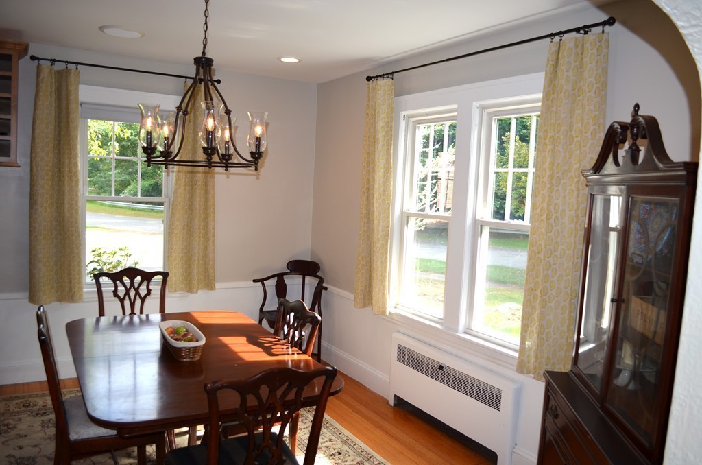 425 Trafton Road Springfield, MA 01108 - Photo 15 of 28 a view of a dining room with furniture window and wooden floor