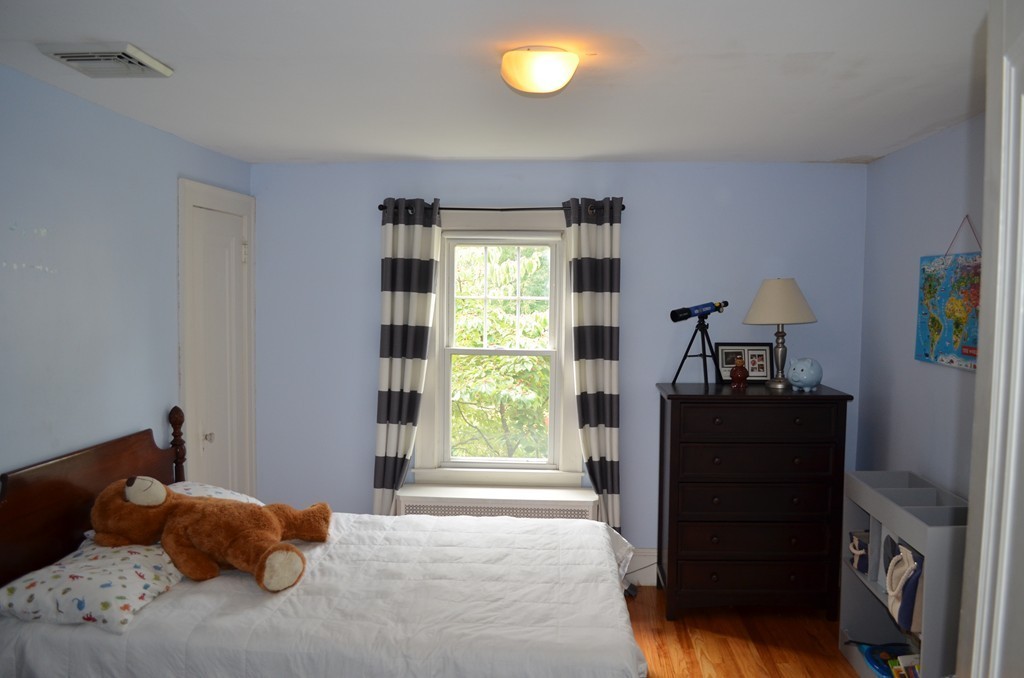 425 Trafton Road Springfield, MA 01108 - Photo 17 of 28 a bedroom with a bed and a window