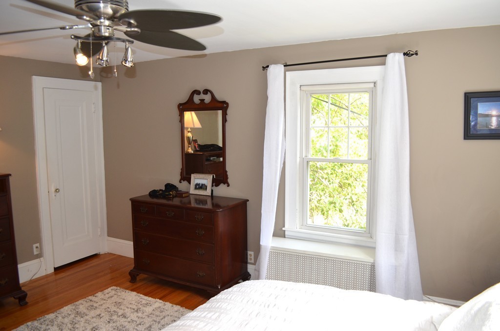 425 Trafton Road Springfield, MA 01108 - Photo 25 of 28 a bedroom with a bed and a mirror