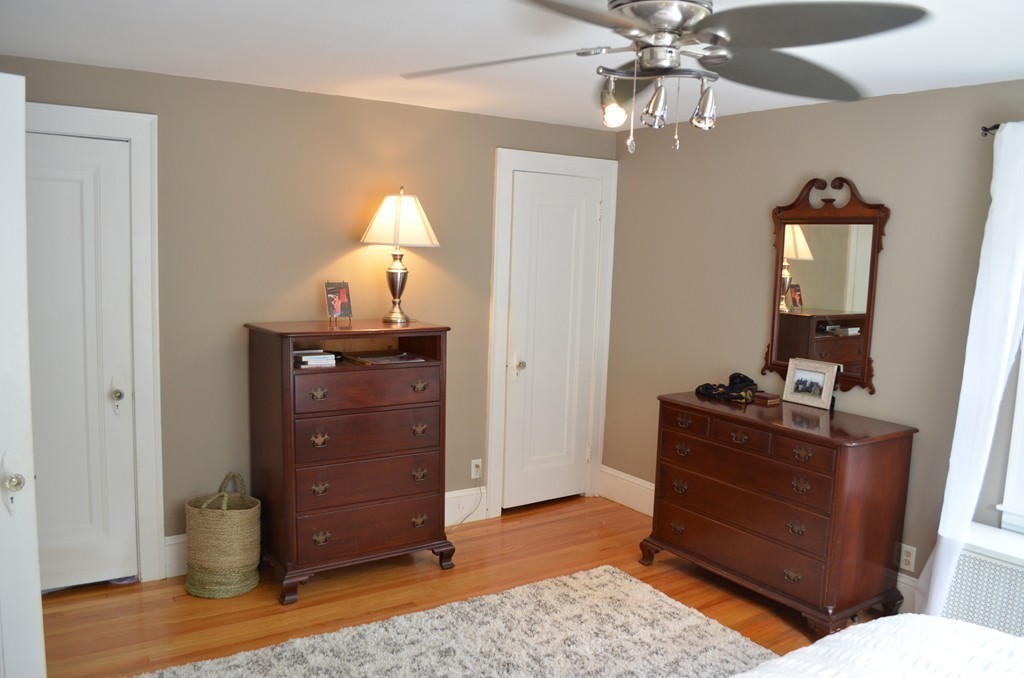 425 Trafton Road Springfield, MA 01108 - Photo 26 of 28 a room with a dresser and a mirror