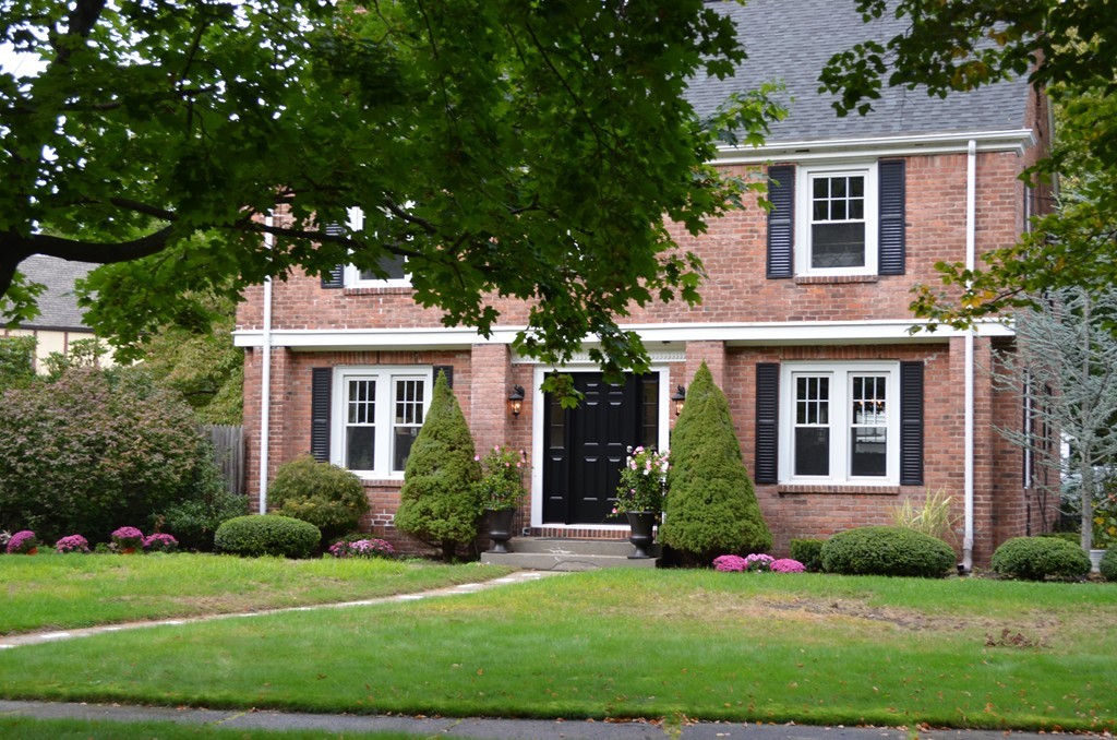 425 Trafton Road Springfield, MA 01108 - Photo 3 of 28 a front view of a house with a yard and trees