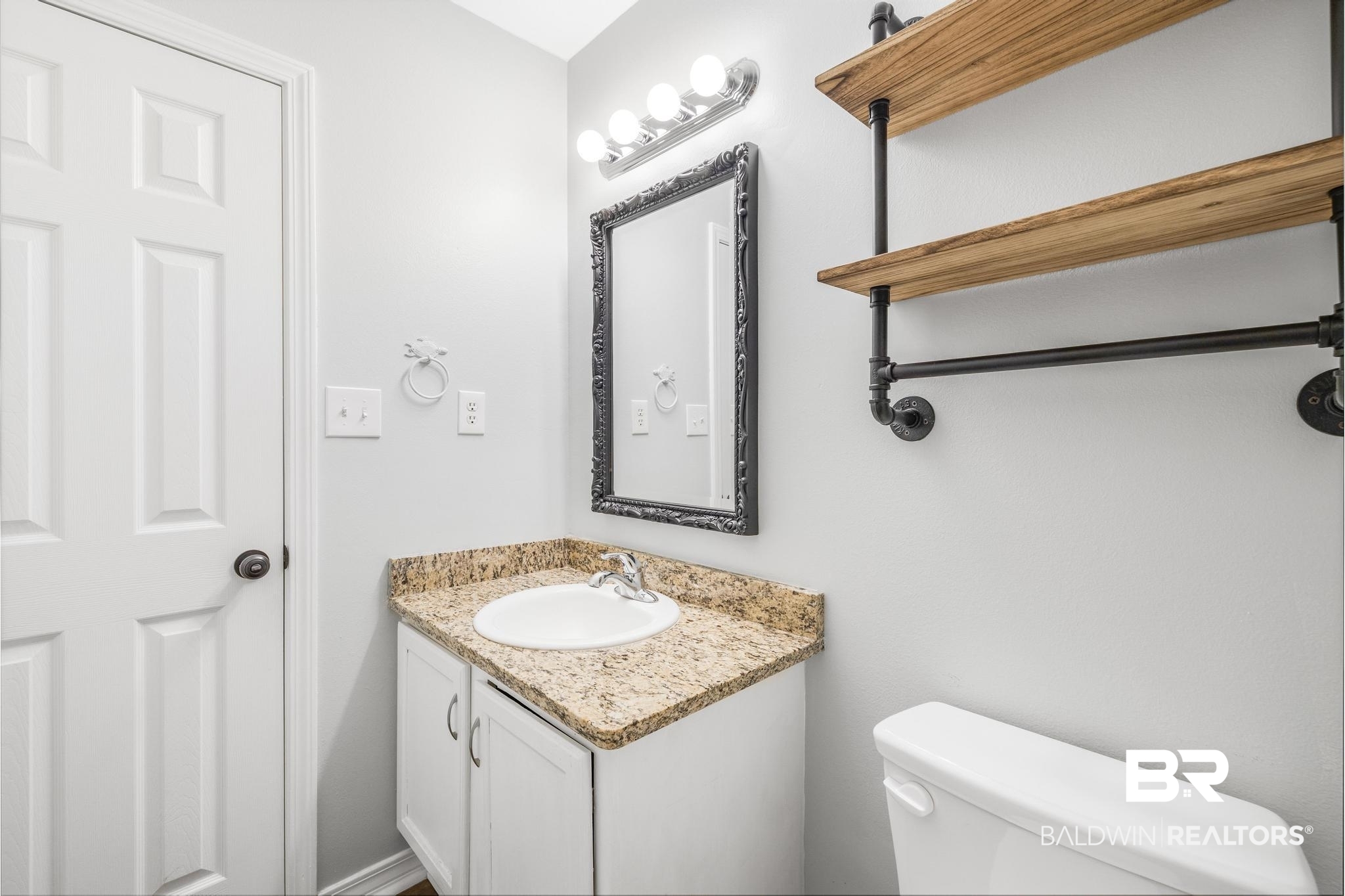 140 Hope Drive Daphne, AL 36526 - Photo 34 of 54 Bathroom with vanity and toilet