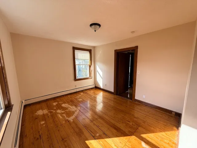 a view of an empty room and window