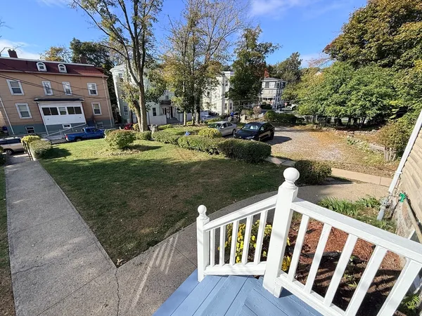 a view of a back yard of the house