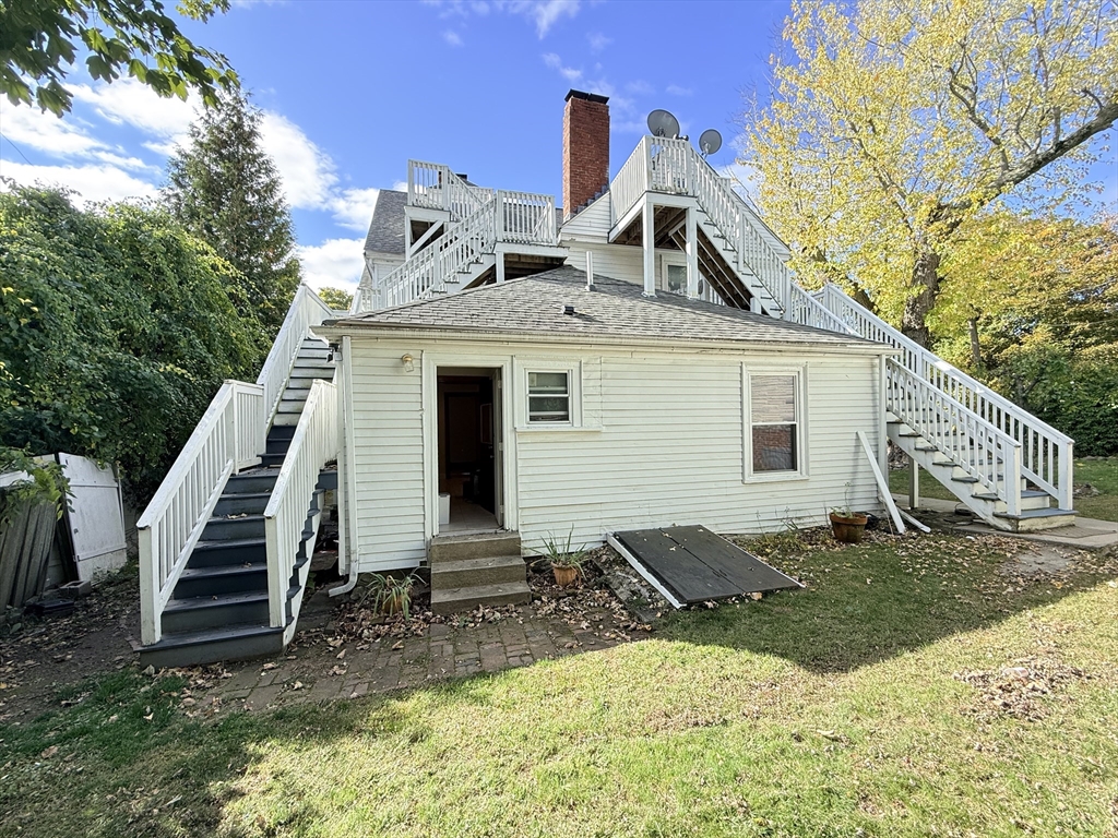 5 Oakland Street, Unit 1 Boston, MA 02119 - Photo 25 of 25 a view of a house with backyard