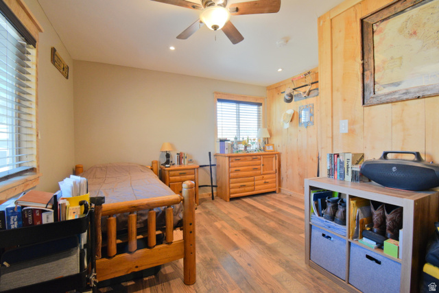 656 South Bullion Canyon Road Marysvale, UT 84750 - Photo 29 of 57 Bedroom featuring wood finished floors, a ceiling fan, recessed lighting, and wooden walls
