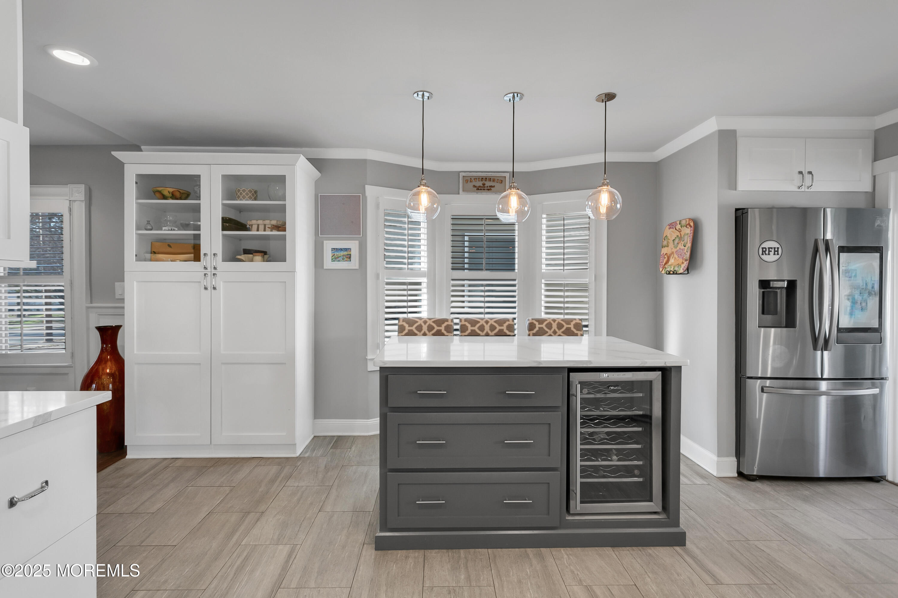 7 Allen Street Rumson, NJ 07760 - Photo 12 of 45 a kitchen with a refrigerator and countertop wooden cabinets
