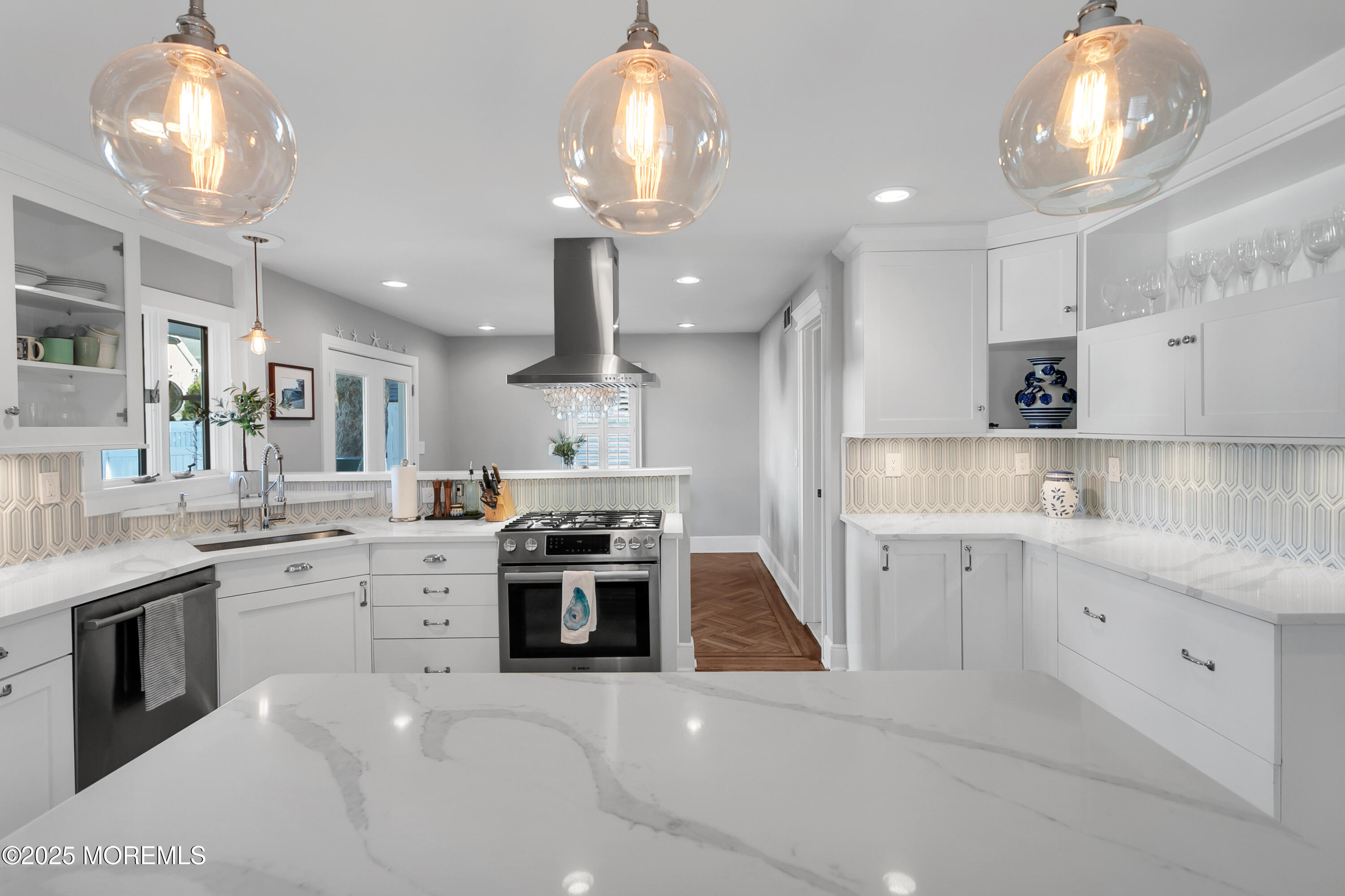 7 Allen Street Rumson, NJ 07760 - Photo 13 of 45 a kitchen with stainless steel appliances kitchen island granite countertop a stove and a sink