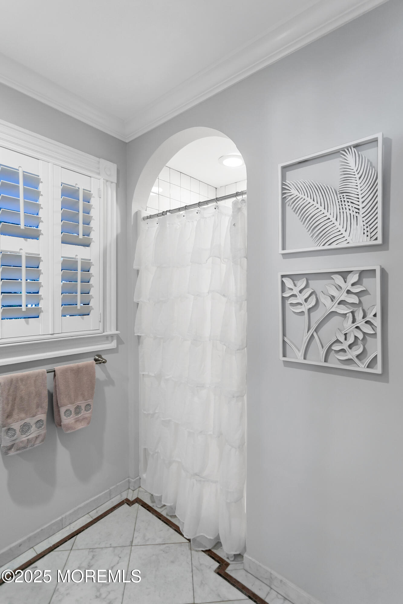 7 Allen Street Rumson, NJ 07760 - Photo 16 of 45 a bathroom with a window and a shower