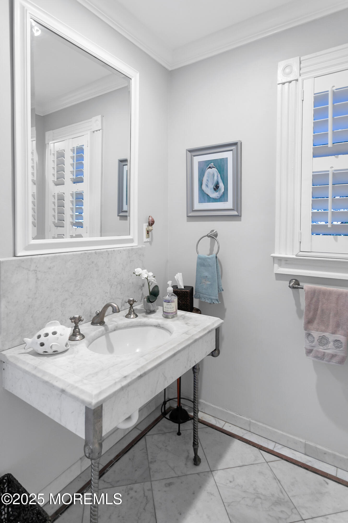 7 Allen Street Rumson, NJ 07760 - Photo 17 of 45 a bathroom with a sink and a mirror