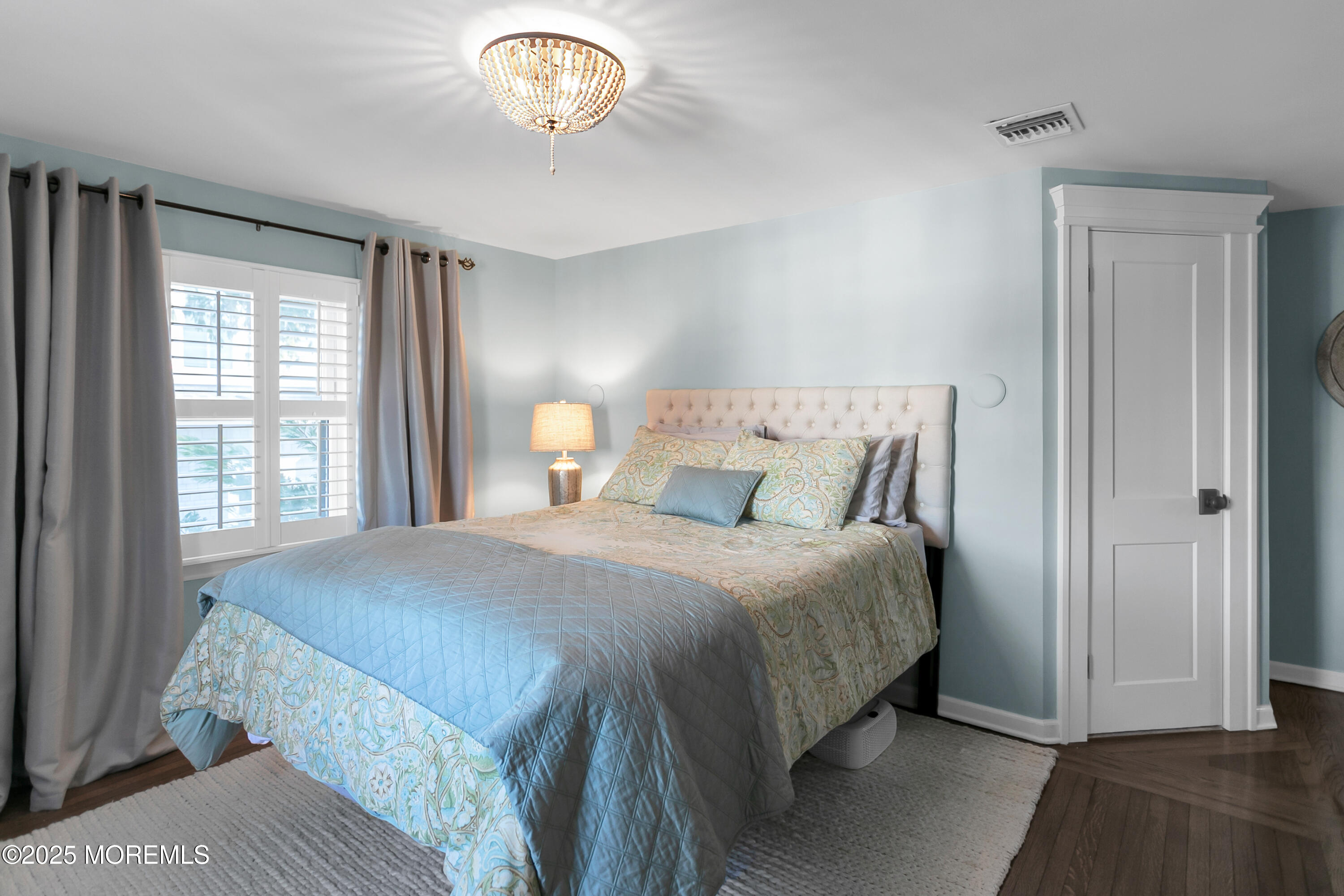 7 Allen Street Rumson, NJ 07760 - Photo 20 of 45 a bedroom with a bed and a window