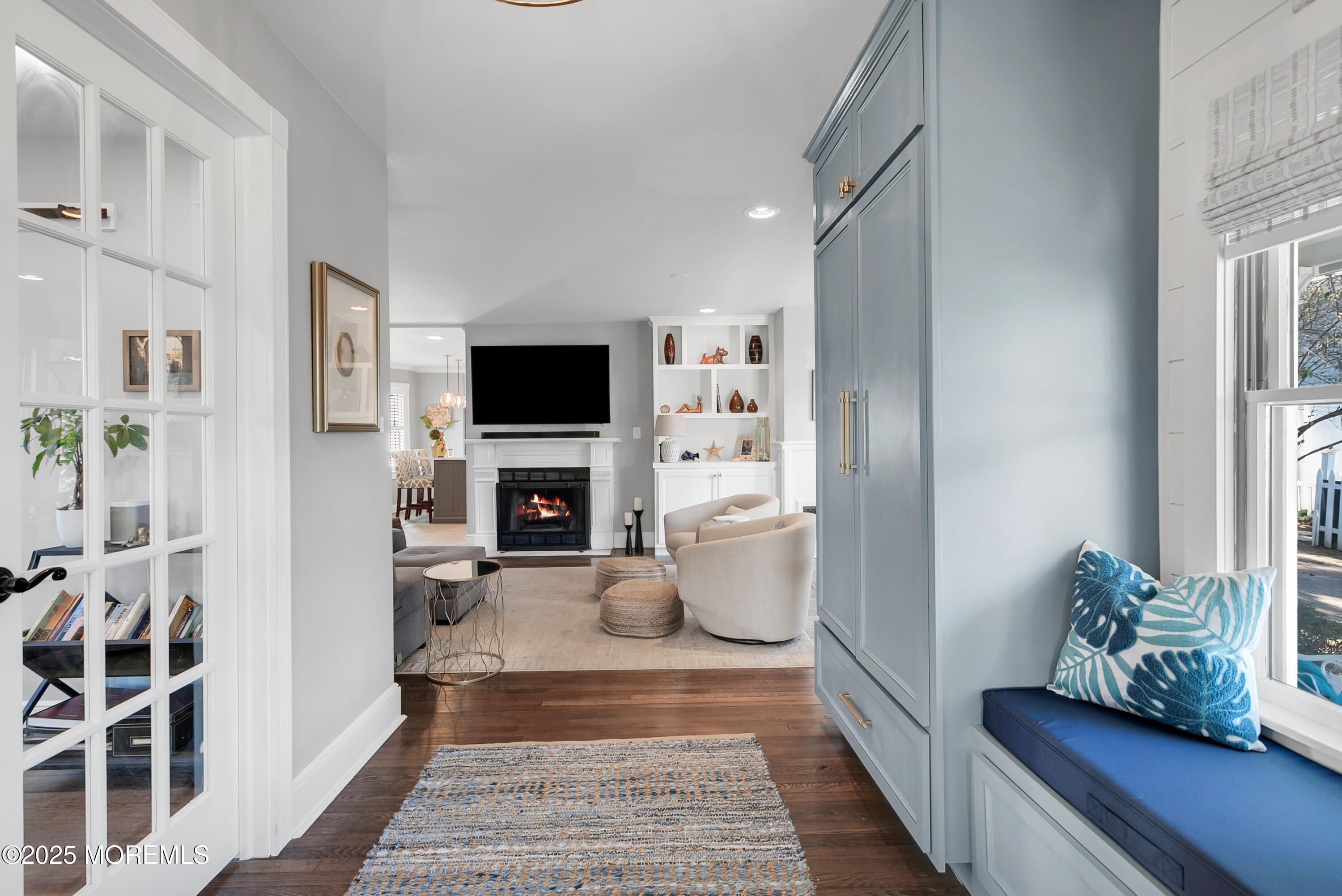 7 Allen Street Rumson, NJ 07760 - Photo 2 of 45 a living room with furniture a rug and a flat screen tv