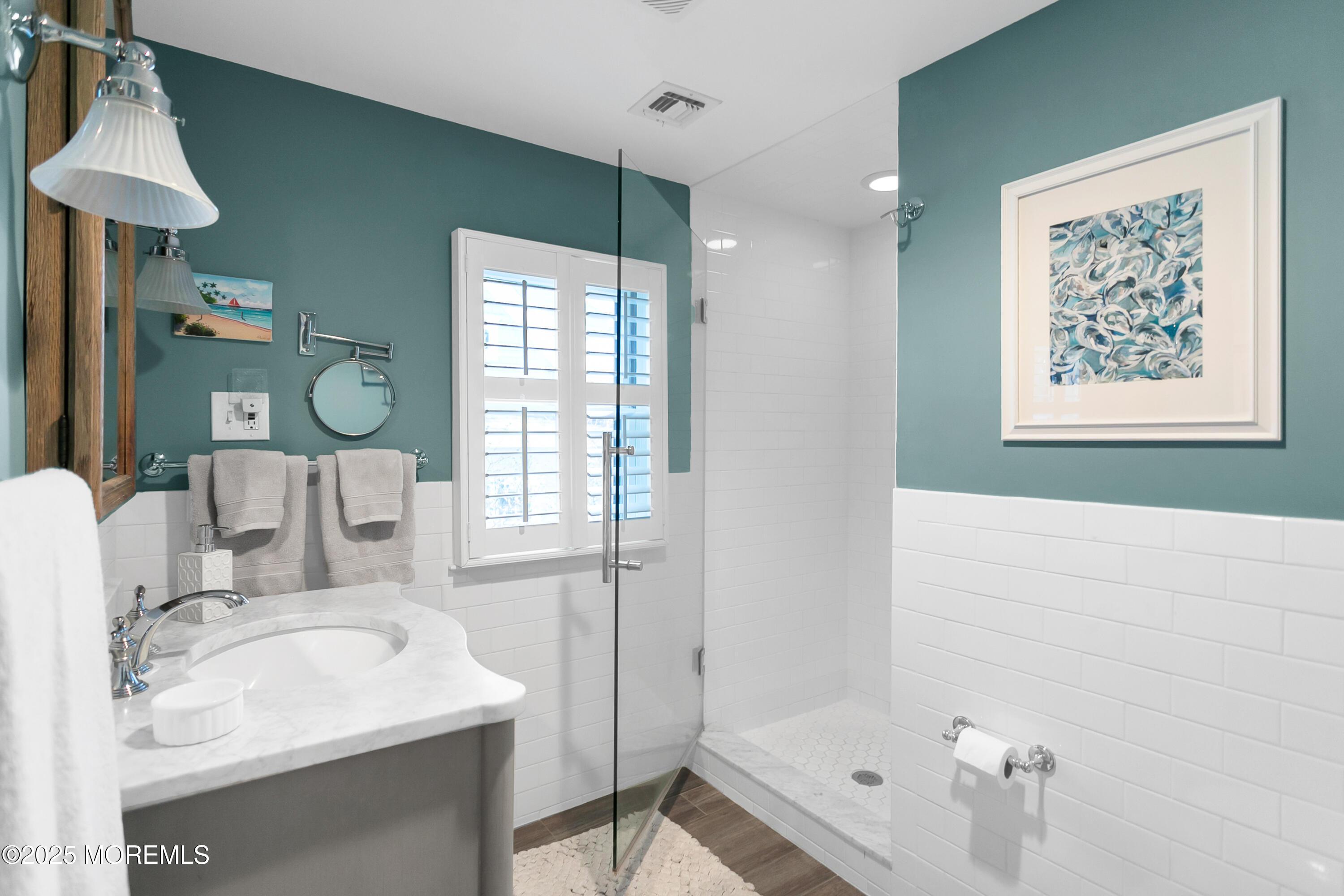 7 Allen Street Rumson, NJ 07760 - Photo 21 of 45 a bathroom with a sink tub and a mirror