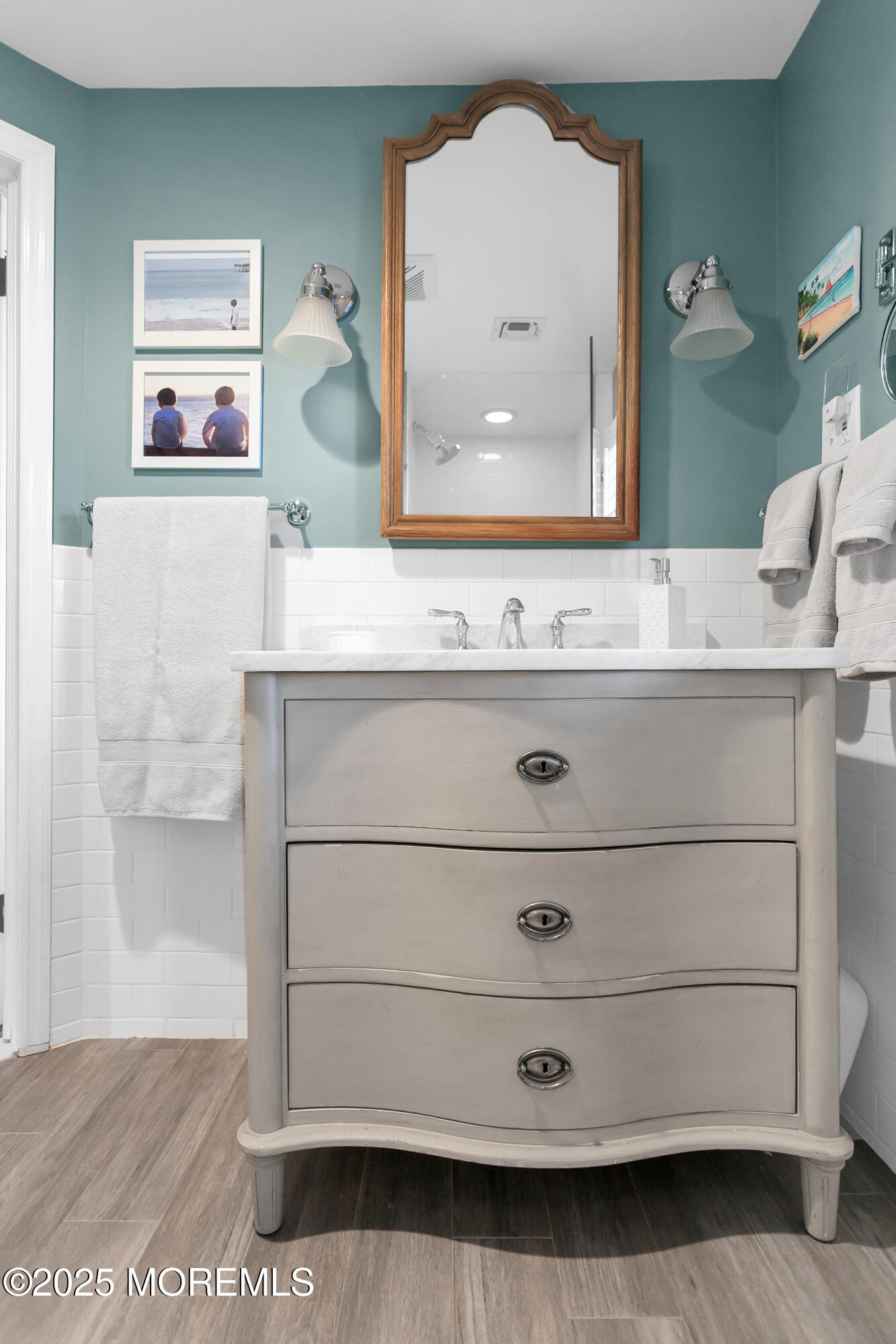 7 Allen Street Rumson, NJ 07760 - Photo 22 of 45 a bathroom with a sink mirror and vanity