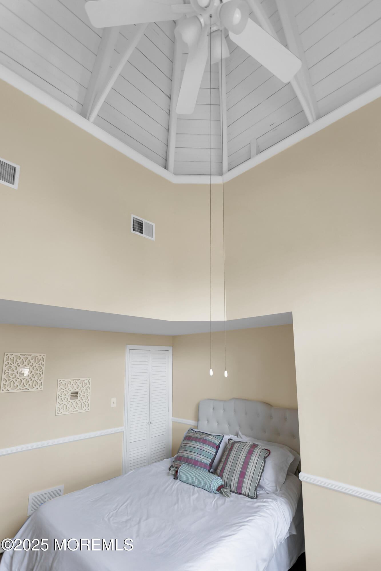 7 Allen Street Rumson, NJ 07760 - Photo 30 of 45 a bedroom with a bed and a ceiling fan