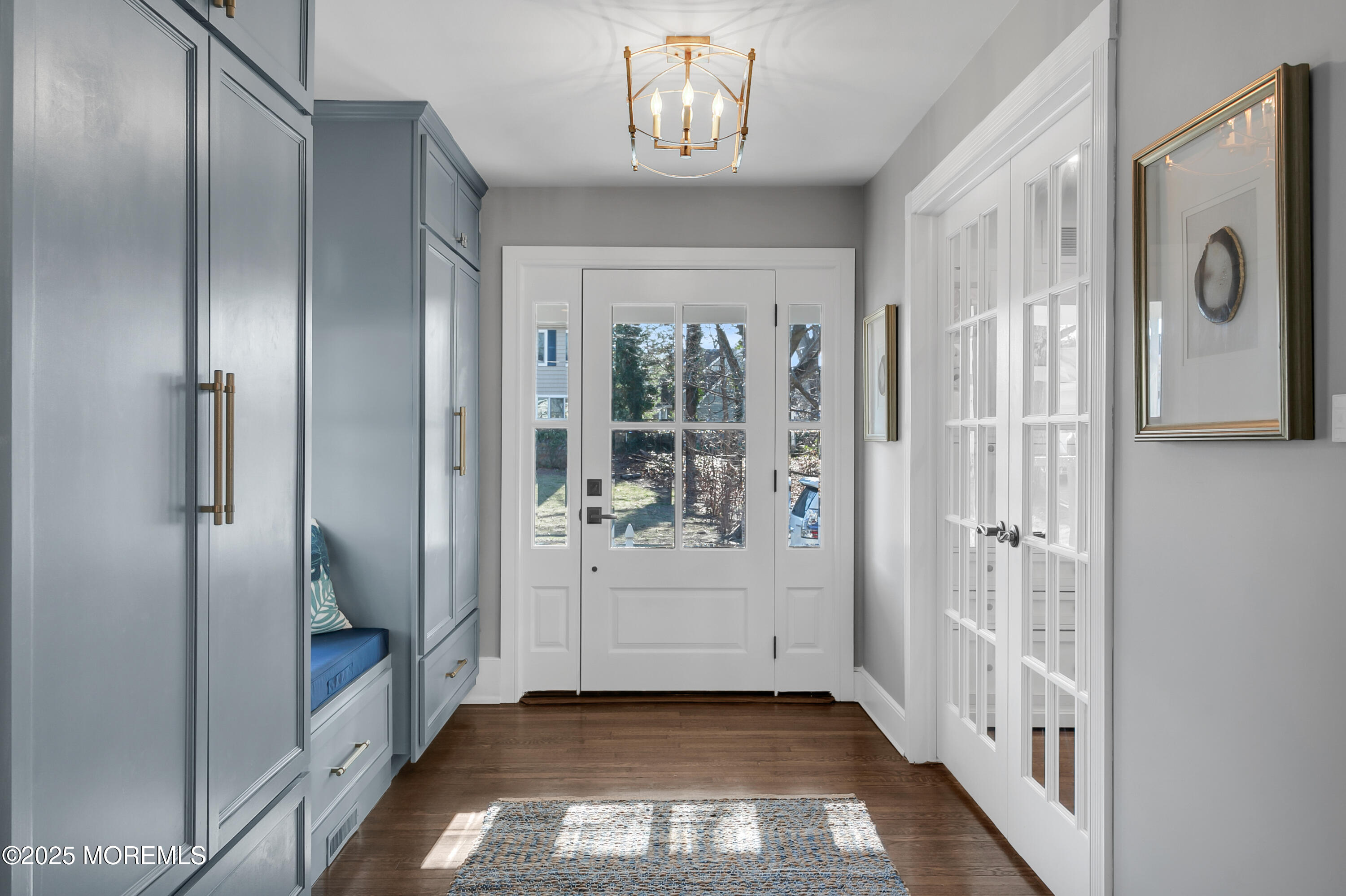 7 Allen Street Rumson, NJ 07760 - Photo 3 of 45 a view of an entryway with wooden floor and door