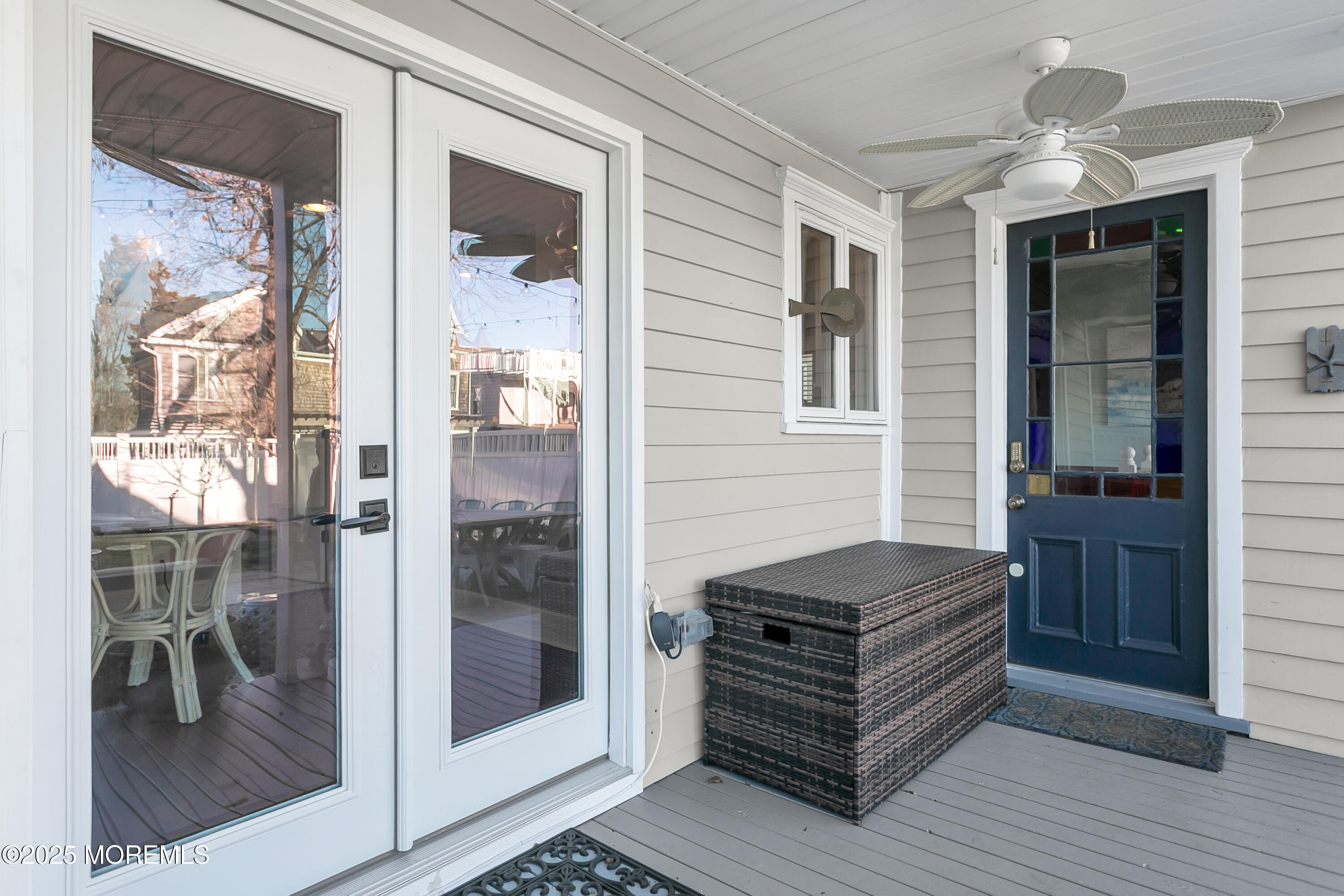 7 Allen Street Rumson, NJ 07760 - Photo 36 of 45 a backyard of a house with barbeque oven and glass door