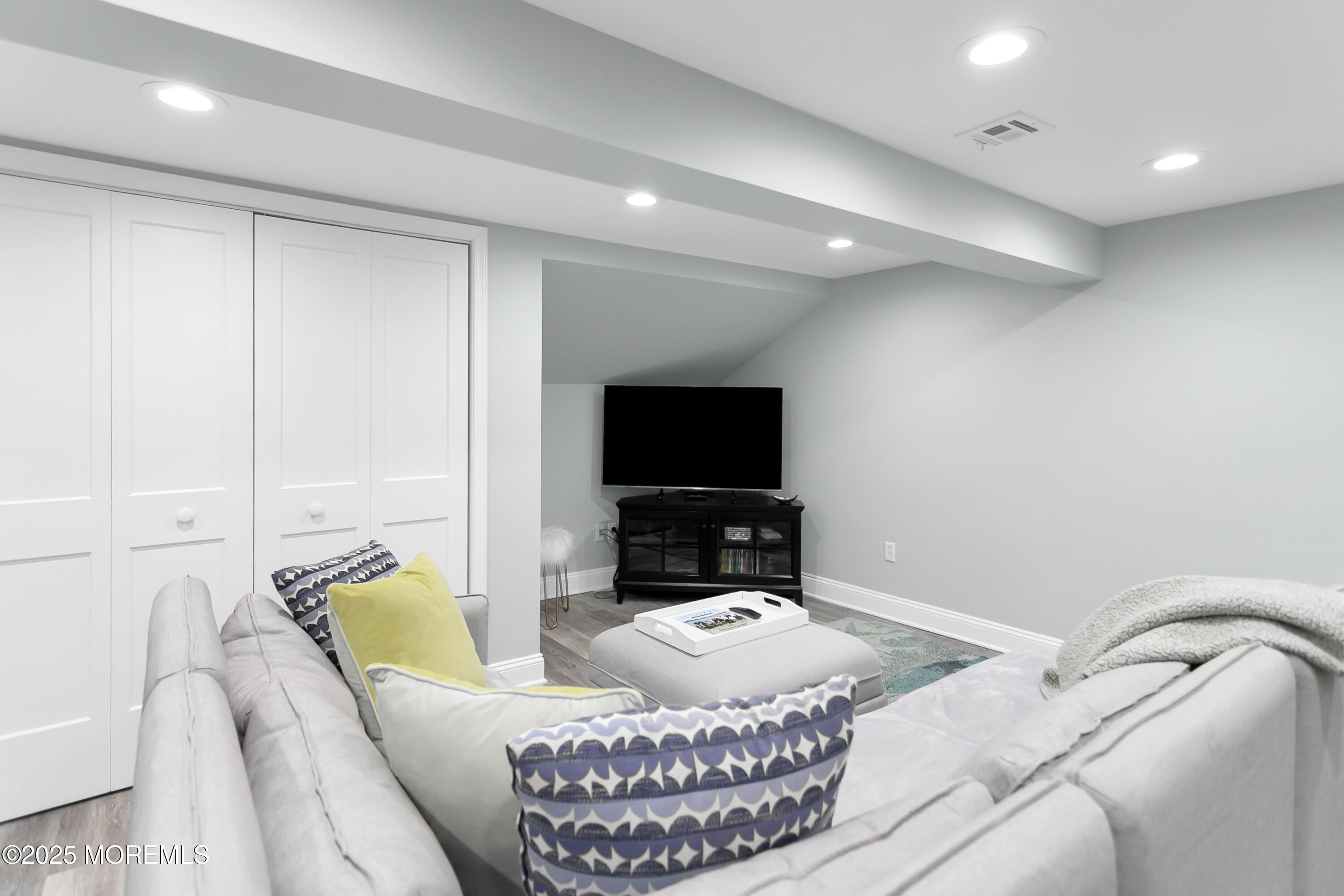 7 Allen Street Rumson, NJ 07760 - Photo 39 of 45 a living room with furniture and a flat screen tv