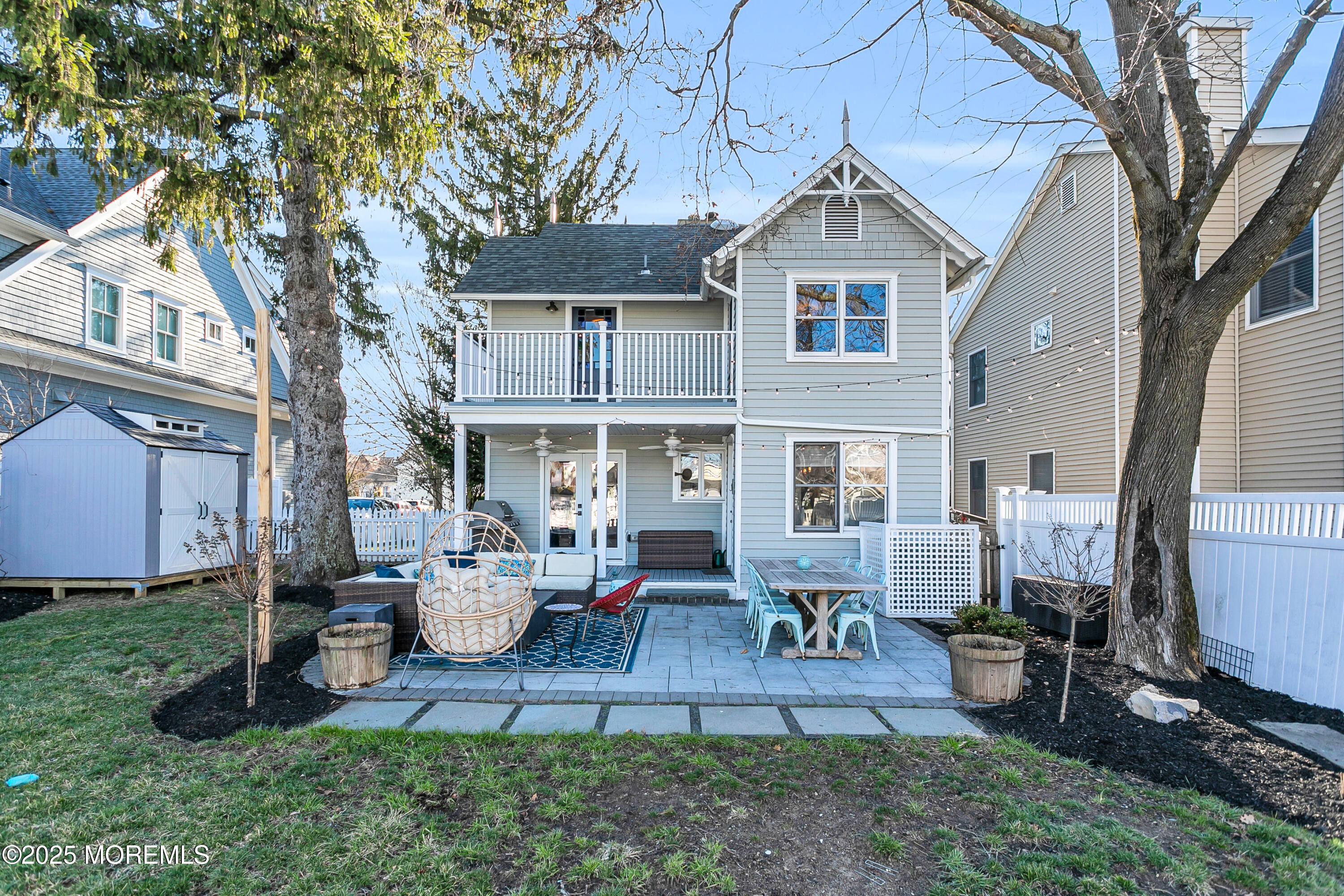 7 Allen Street Rumson, NJ 07760 - Photo 43 of 45 a front view of a house with garden