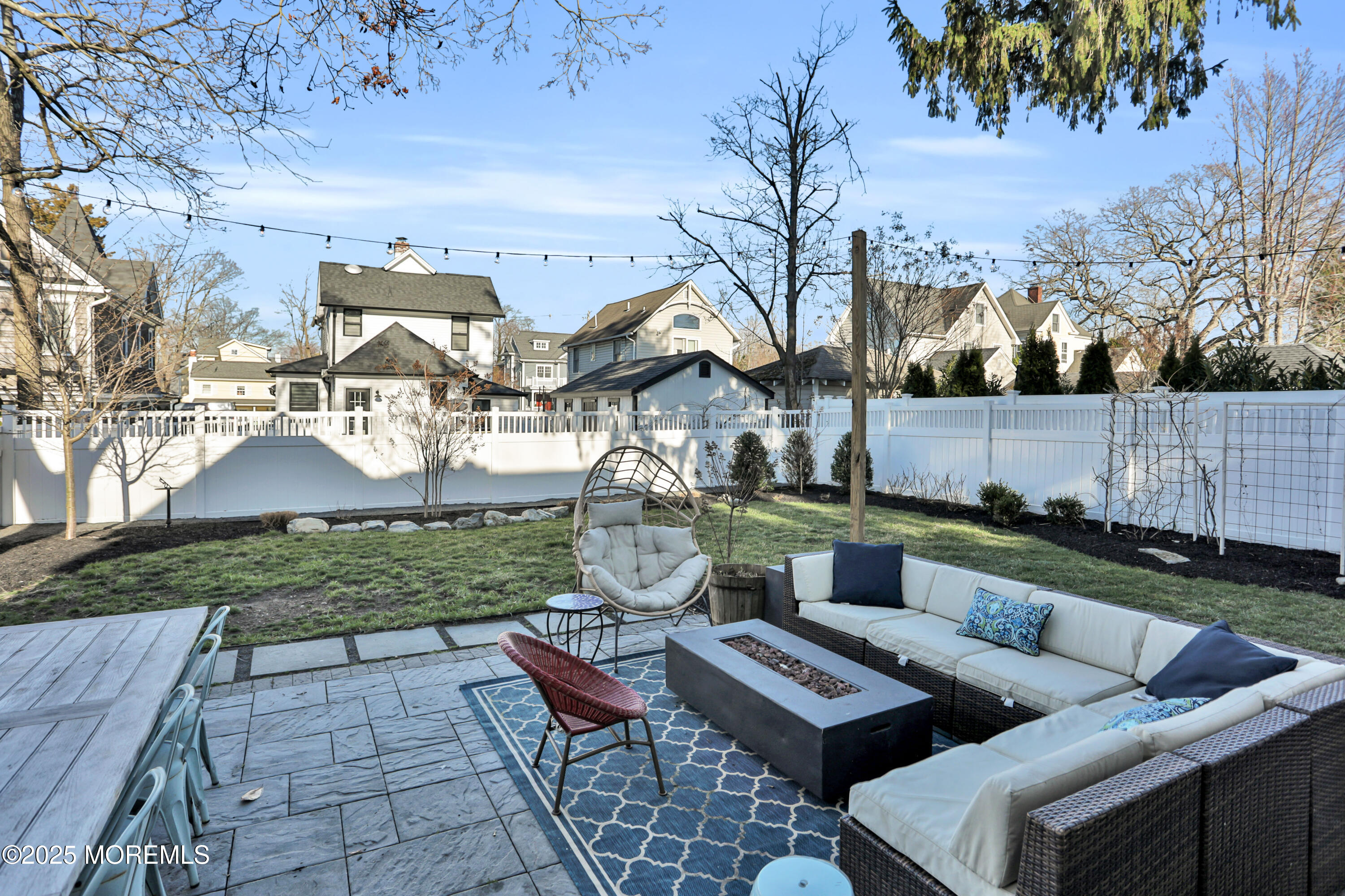 7 Allen Street Rumson, NJ 07760 - Photo 44 of 45 a front view of a house with garden and chairs