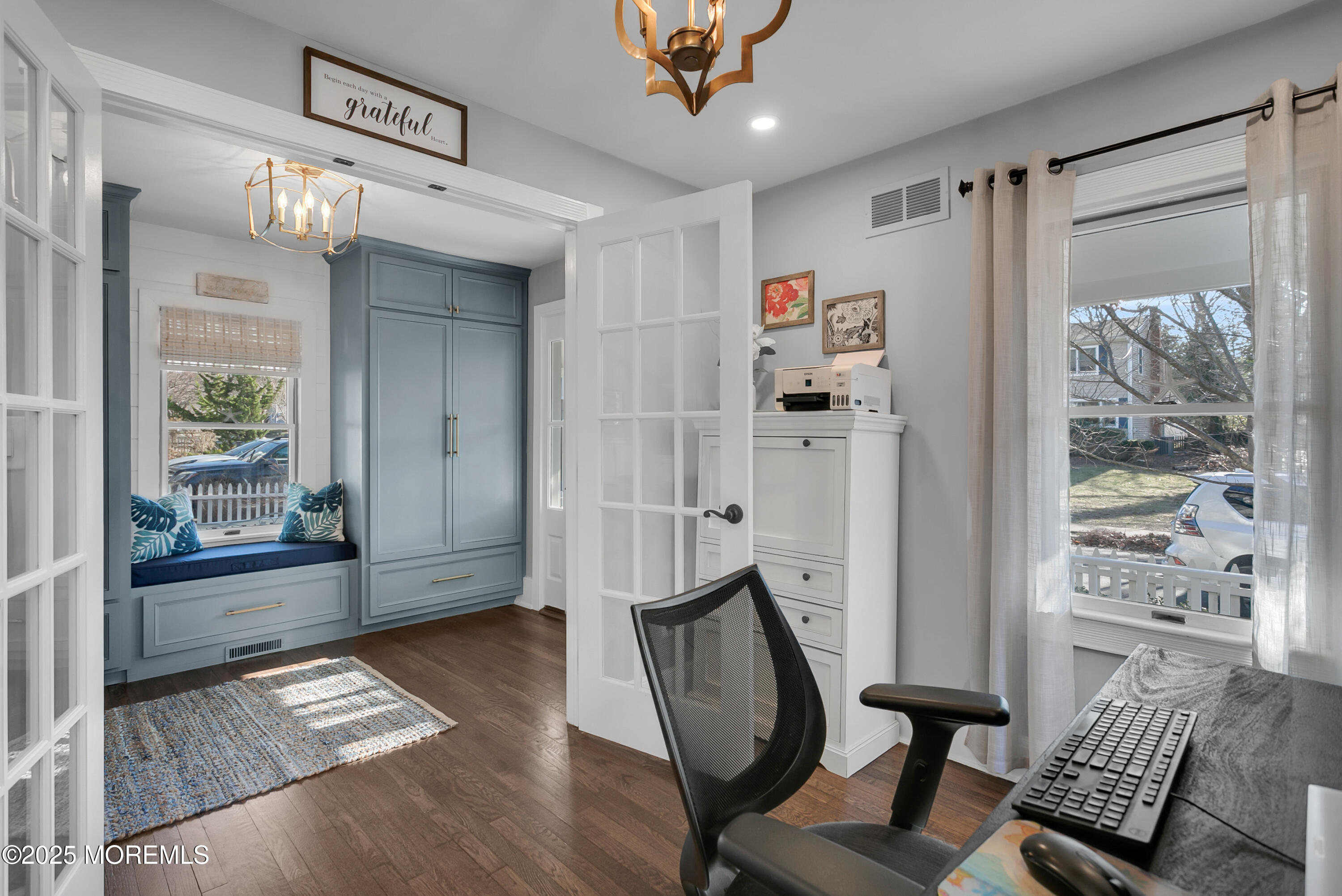 7 Allen Street Rumson, NJ 07760 - Photo 6 of 45 a view of a hallway with wooden floor and a dining room