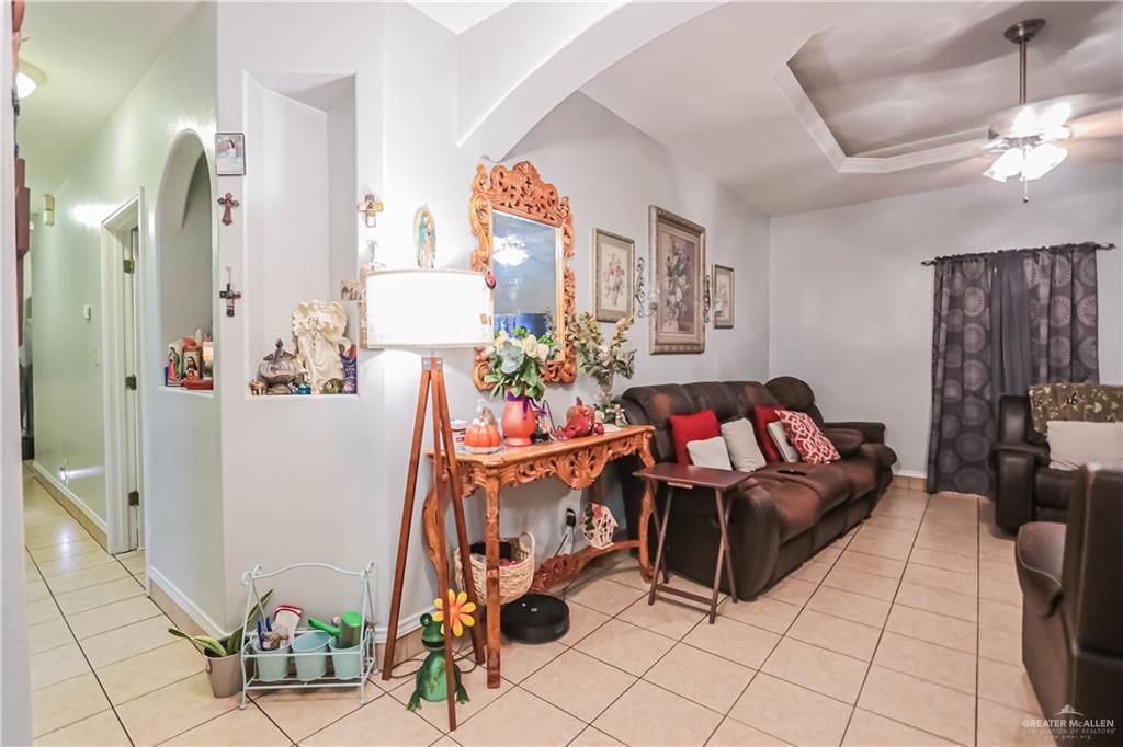 4701 Russell Circle Mission, TX 78574 - Photo 11 of 41 a living room with furniture and a flat screen tv