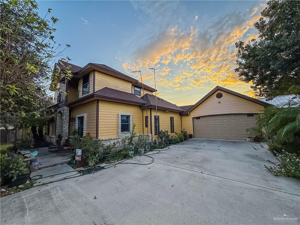 4701 Russell Circle Mission, TX 78574 - Photo 2 of 41 a front view of house with yard and trees around