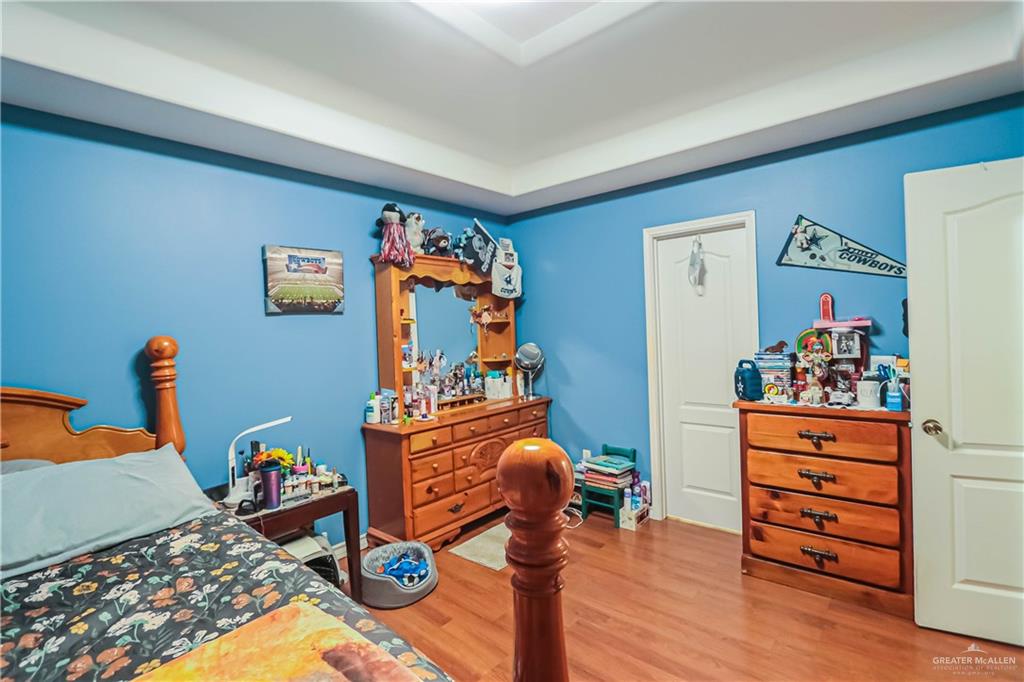 4701 Russell Circle Mission, TX 78574 - Photo 22 of 41 Bedroom featuring light wood-style flooring