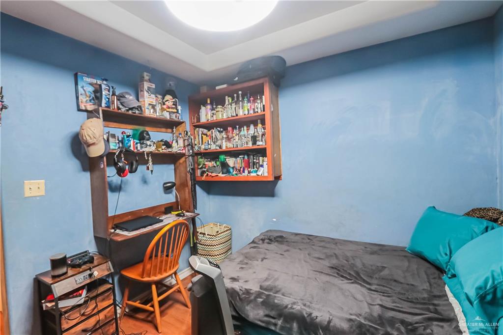4701 Russell Circle Mission, TX 78574 - Photo 23 of 41 Bedroom with wood finished floors