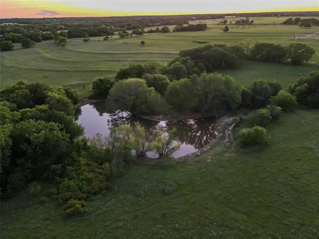 5444 Well Service Road Bowie, TX 76230 - Photo 12 of 38 a view of lake with green space