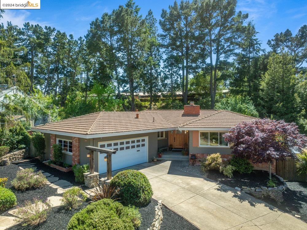 a sign board with a small yard