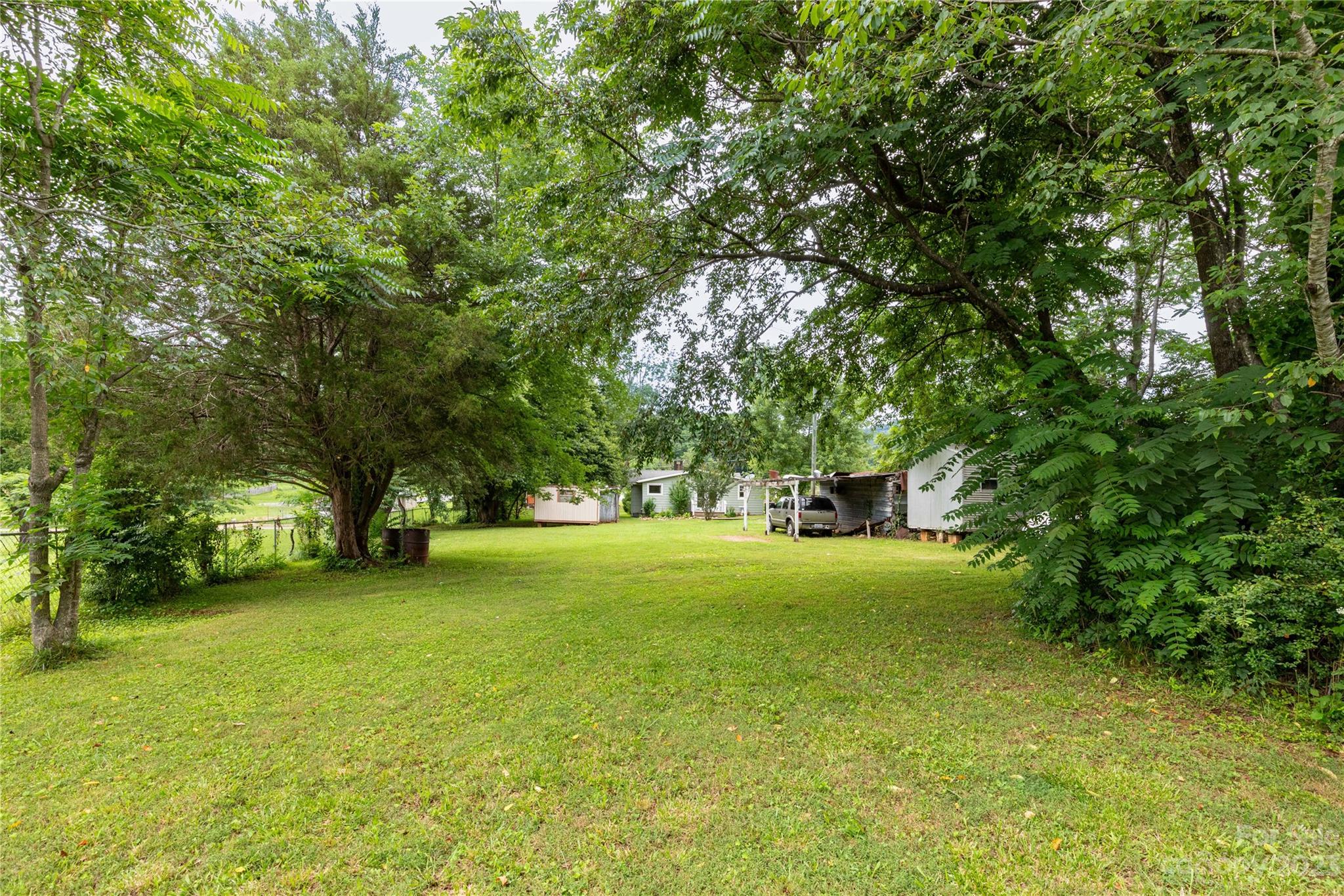 558 Jacktown Road Marion, NC 28752 - Photo 14 of 26 a view of a trees in front of a building