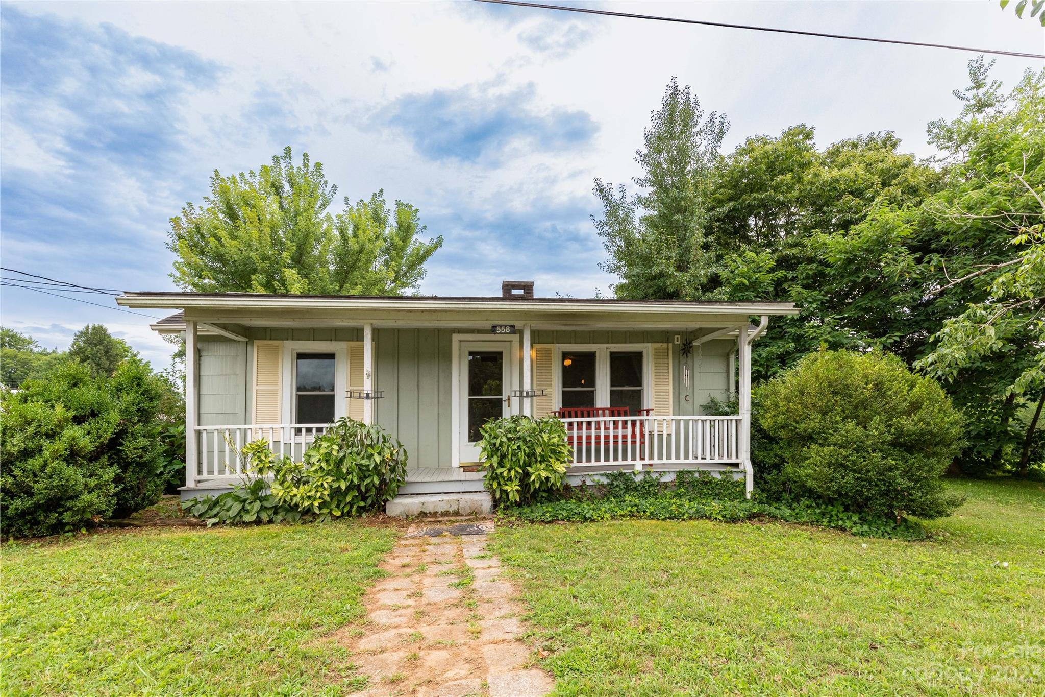 558 Jacktown Road Marion, NC 28752 - Photo 20 of 26 a front view of house with yard and trees around
