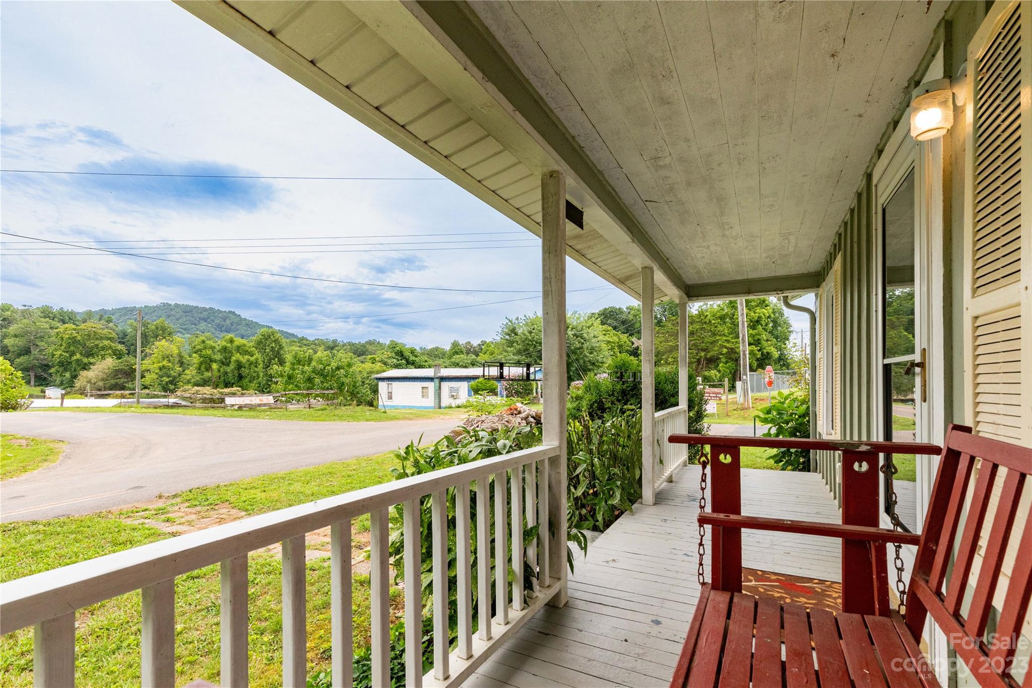 558 Jacktown Road Marion, NC 28752 - Photo 22 of 26 a view of a city from a balcony with outdoor seating