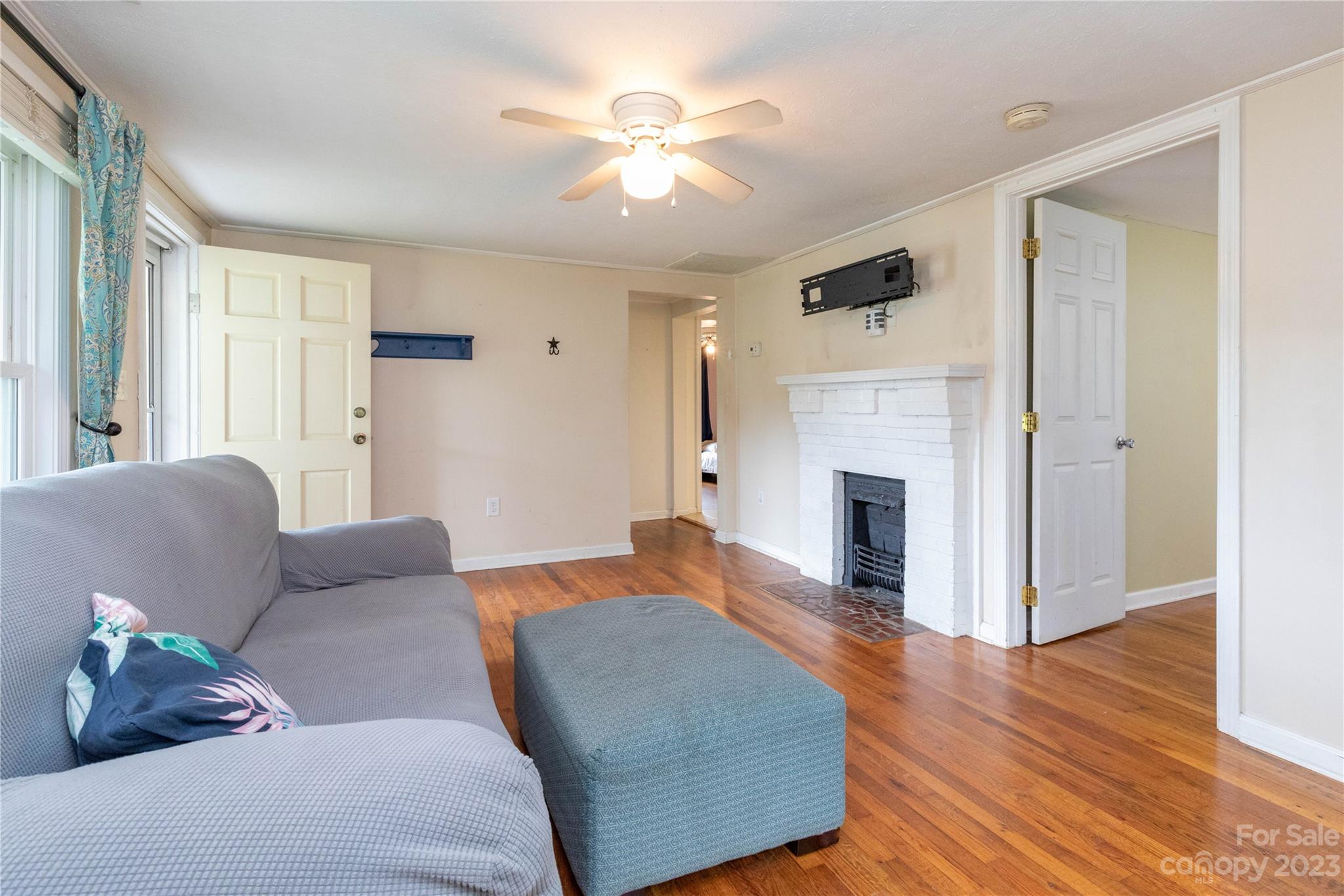 558 Jacktown Road Marion, NC 28752 - Photo 5 of 26 a living room with furniture and a fireplace