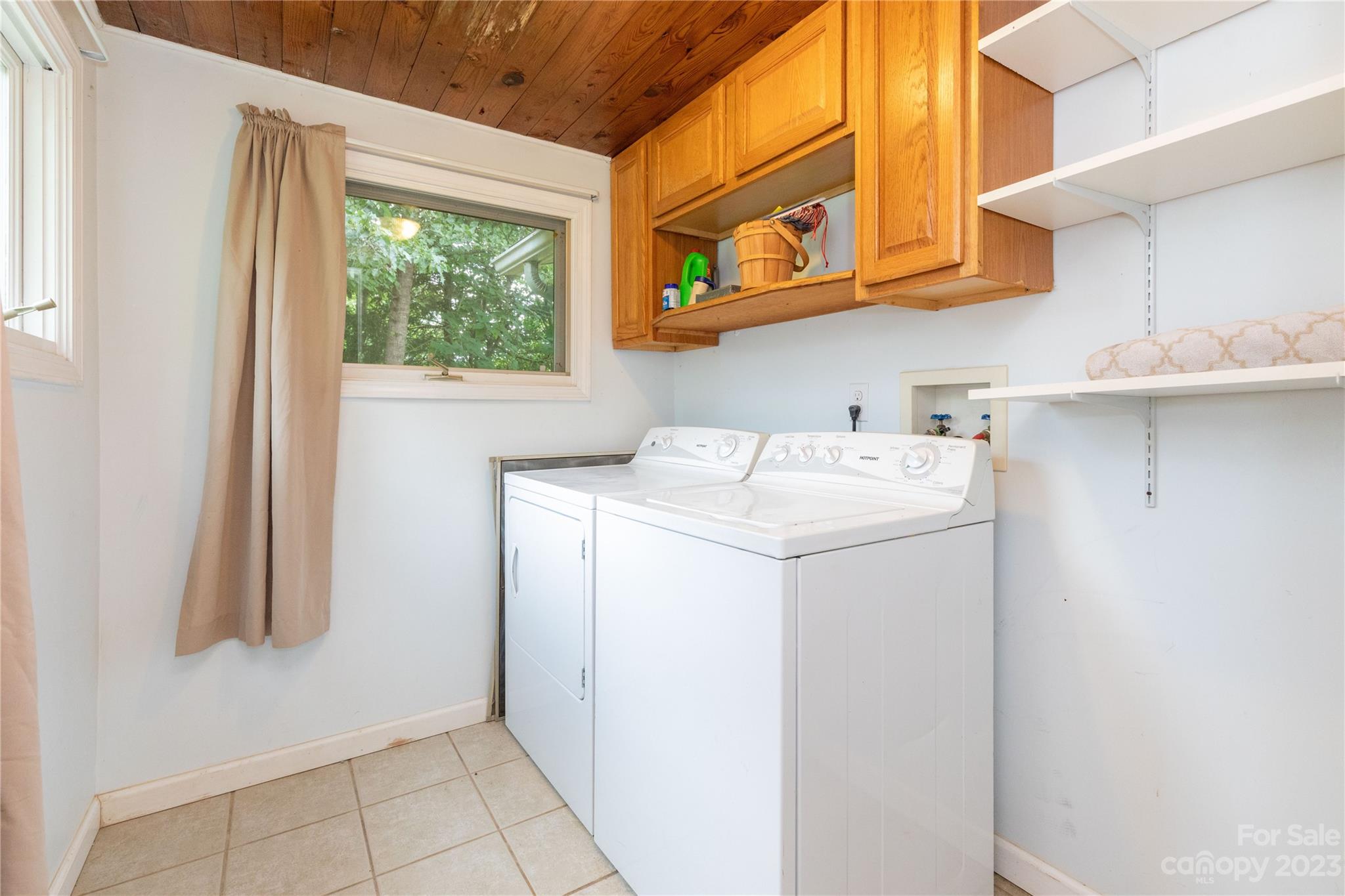 558 Jacktown Road Marion, NC 28752 - Photo 9 of 26 a utility room with dryer and washer
