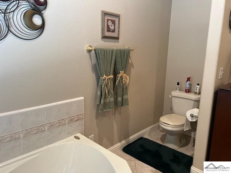 19740 Reeds Creek Road Red Bluff, CA 96080 - Photo 39 of 51 a bathroom with a sink a toilet and shower