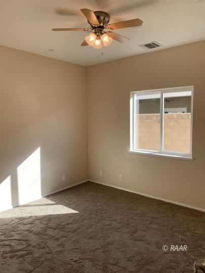 425 Randall Street Ridgecrest, CA 93555 - Photo 12 of 27 a view of an empty room with a window