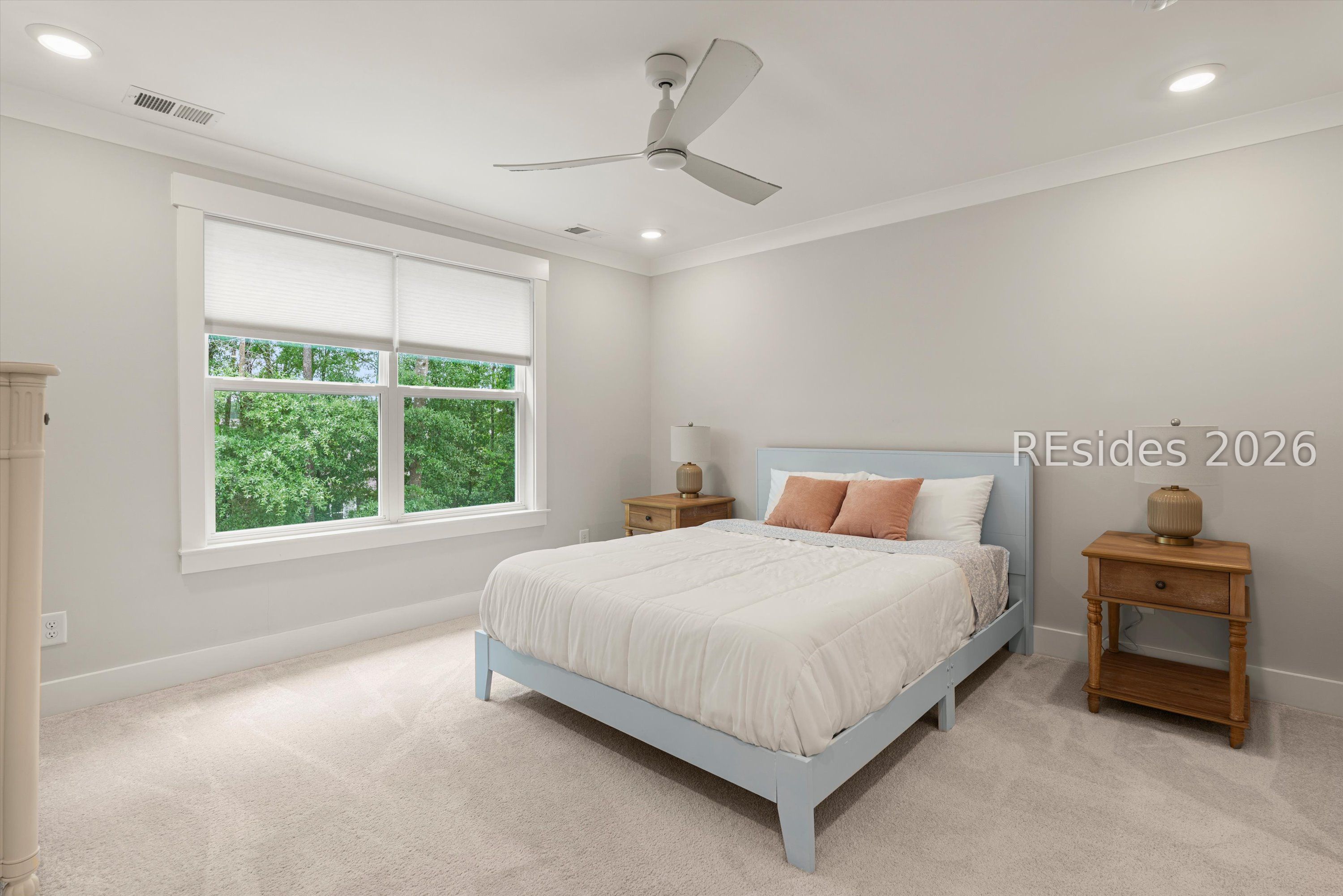 318 Forest Trace Bluffton, SC 29910 - Photo 29 of 59 Large Primary Bedroom with Scenic Wooded View