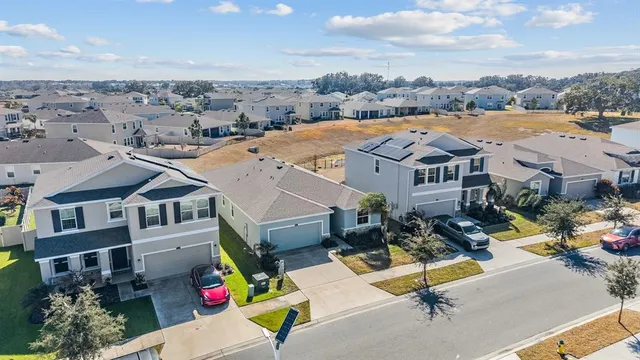 a kitchen with granite countertop stainless steel appliances and wooden cabinets