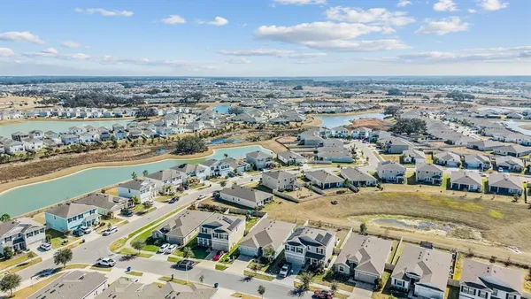 a view of a swimming pool with a lounge chairs