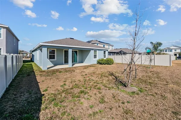 a view of a yard in front of house