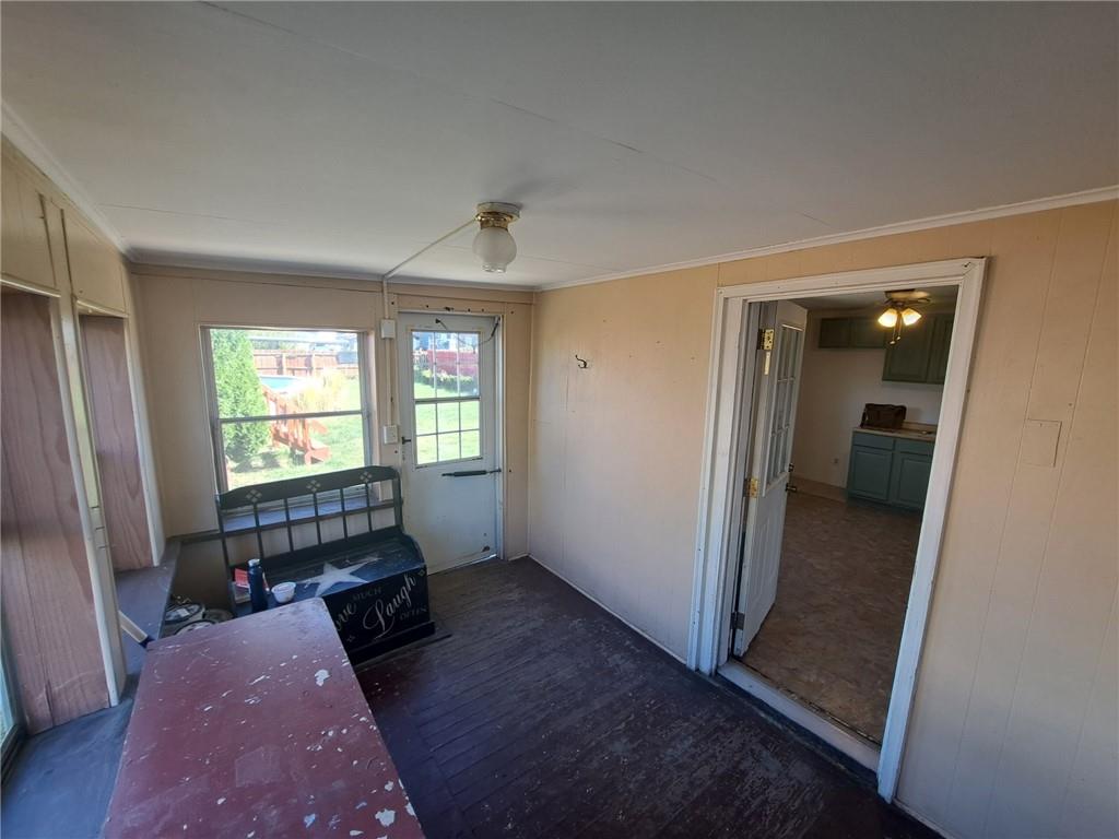 414 Liberty Street Perryopolis, PA 15473 - Photo 25 of 26 wooden floor in an empty room with a window