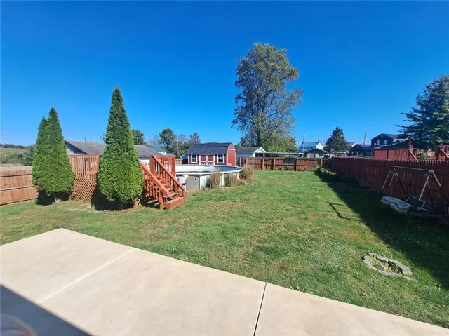 a view of a garden with a slide