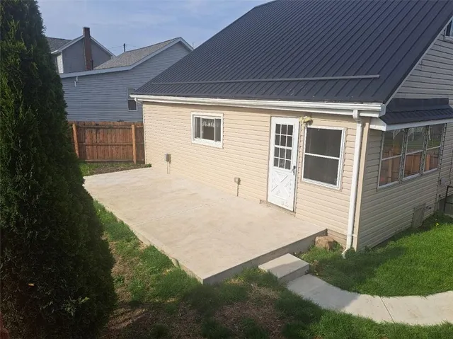a view of a porch with a fence