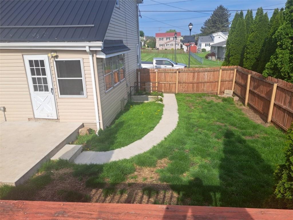 414 Liberty Street Perryopolis, PA 15473 - Photo 8 of 26 a view of a porch with a fence