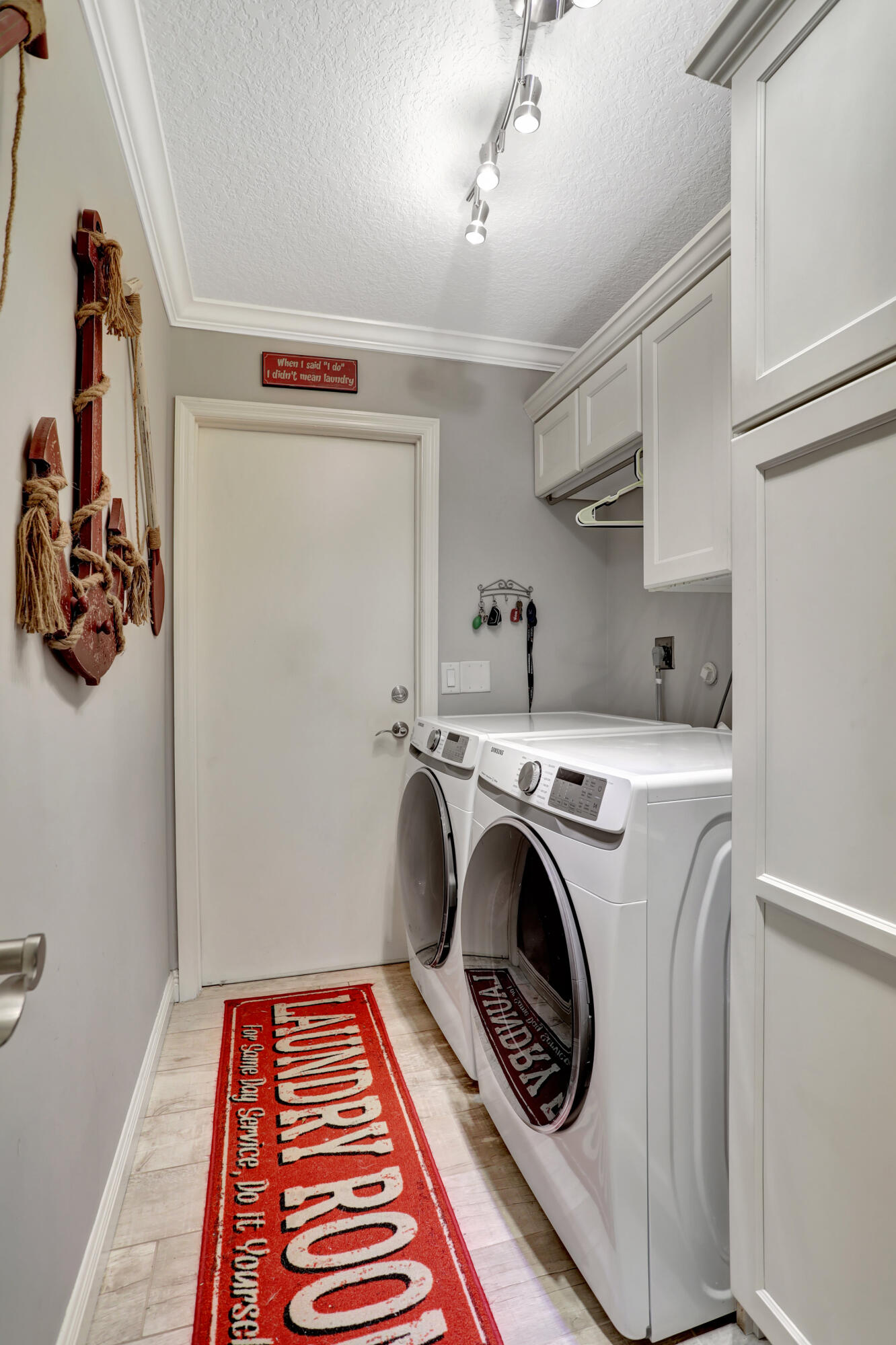 9142 Southwest 22nd Street, Unit E Boca Raton, FL 33428 - Photo 26 of 51 a utility room with dryer and washer